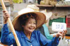 Woman on a boat at the Floating Market