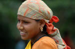 One of the three women laborers on a small construction project inside the complex.