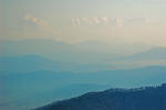 The faint white peak on the left is Trishul,additional pictures of which can be seen by clicking on the links in the parenthesis above.