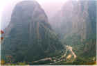 The train in the valley below the ruins